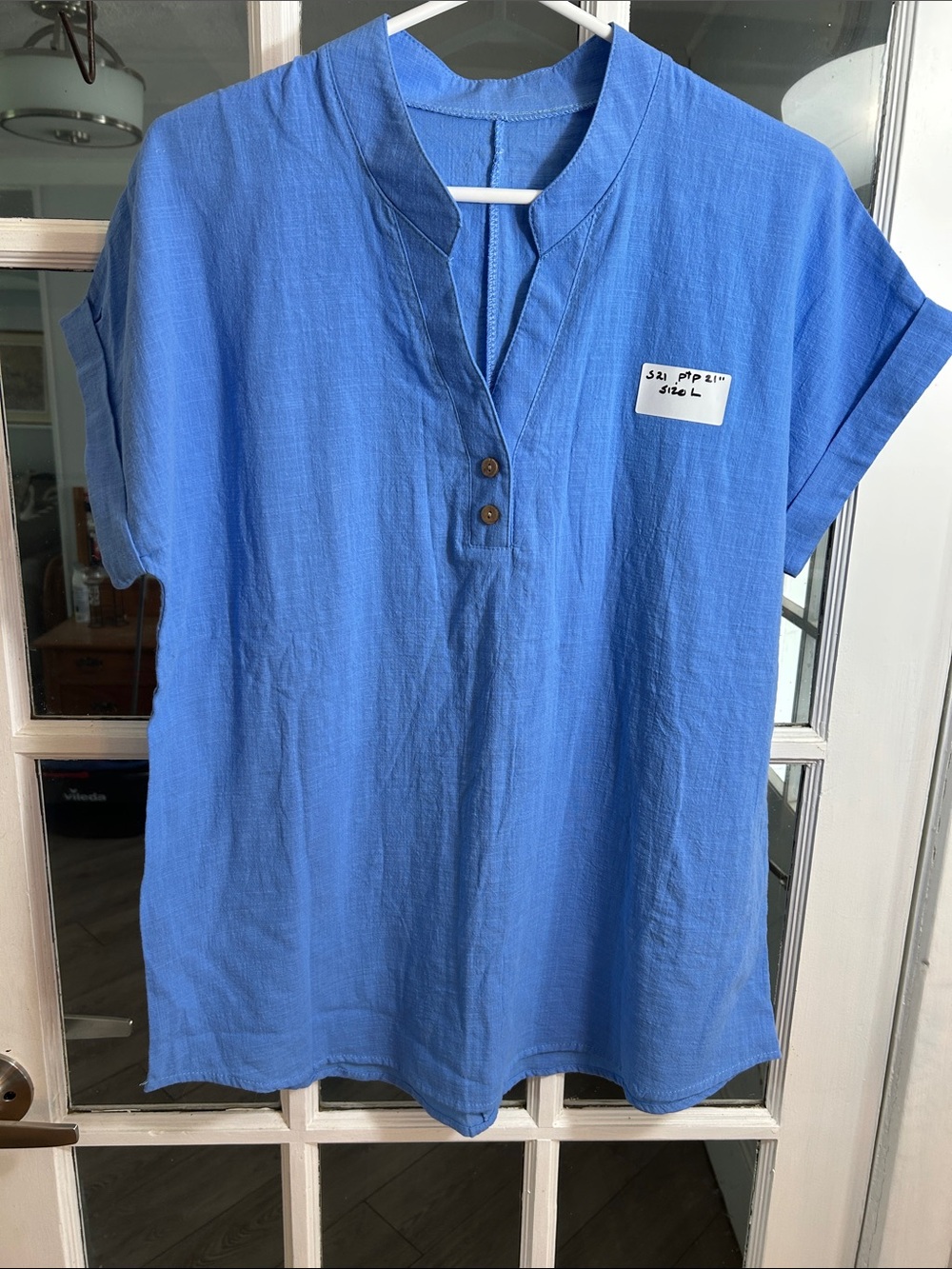 S21.    Relaxed Blue Short-Sleeve Henley Tunic with Button Placket